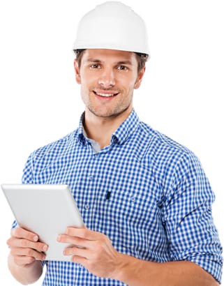 Property rehab contractor in hard hat standing and using tablet